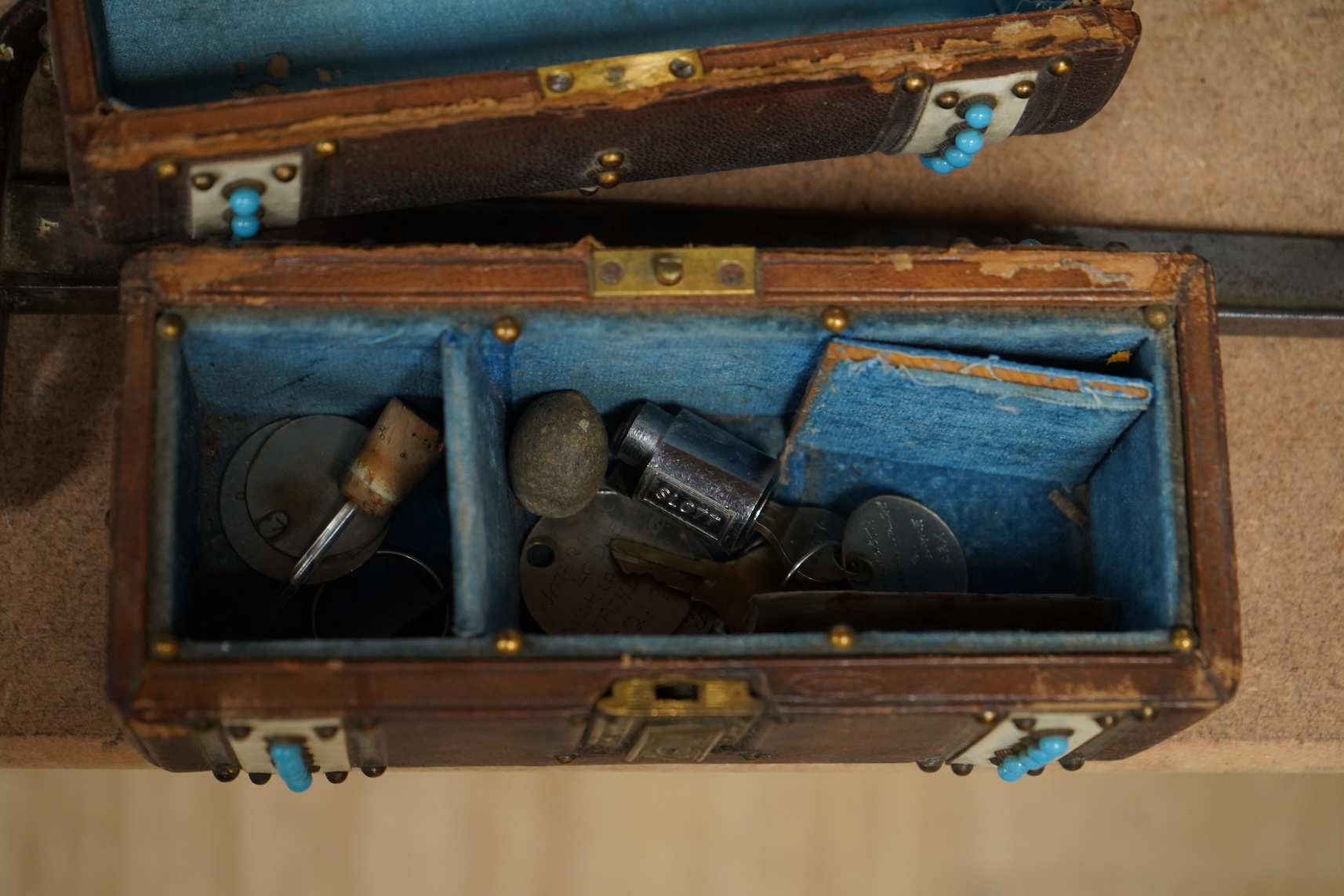 A 19th century brass mounted bayonet together with a tea caddy and a domed casket (a.f)